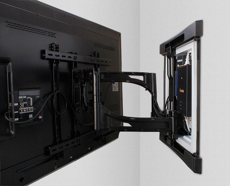 Back of a wall-mounted TV on a full-motion articulating arm with a recessed wall box for cables and power